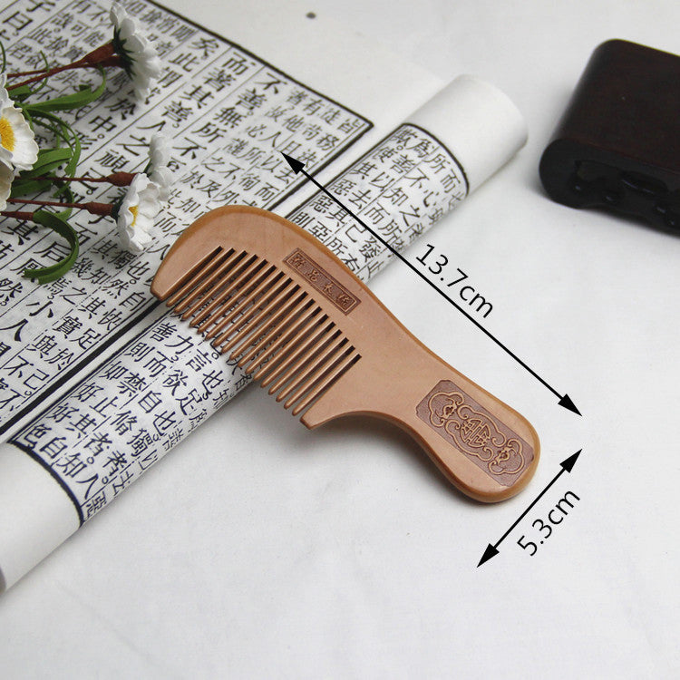 Natural mahogany comb